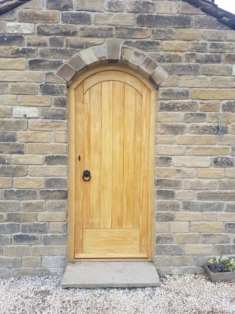 Match Boarded Arch Top Wooden Door Installation - Wainstalls, Halifax